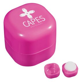 pink cube lip moisturizer with a screwable cap and an imprint saying capes oncology