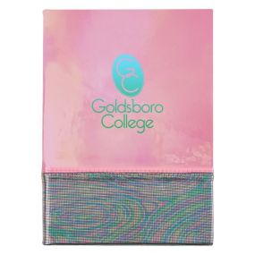 pink pearlescent journal with an imprint saying goldsboro college