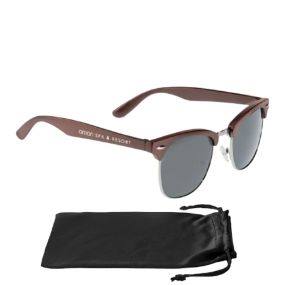 brown sunglasses with a black microfiber pouch and an imprint saying aman spa & resort