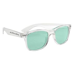 a translucent pair of sunglasses with green lenses and an imprint saying Aliceville