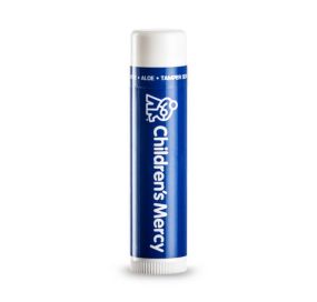 white lip balm with an imprint of a blue background and text saying children's mercy