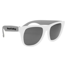 white sunglasses with gray temples and an imprint saying Sun Valley