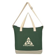natural and green colored cotton tote bag with front pocket, adjustable straps, top zippered pocket, and an imprint saying enterprise lab