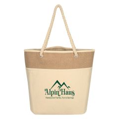 natural cotton tote bag with rope handles and an imprint saying alpin haus rediscover family, fun & savings