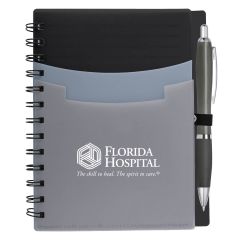 personalized black and gray notebook with 3 pockets on front, matching pen, and an imprint saying florida hospital the skill to heal. the spirit to care.