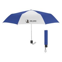 blue and white patterned umbrella with a matching sleeve and an imprint saying Rain Water Conservation