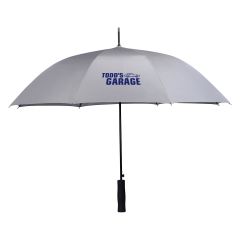 gray umbrella with a silver underside and an imprint saying Todd's Garage