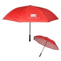 red umbrella with a striped pattern underside and an imprint saying Holiday Resort