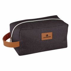 black toiletry bag with side handle, front zippered compartment, and leatherette patch and an imprint saying outrigger