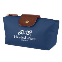 blue cosmetic bag with leatherette flap closure and zippered main compartment