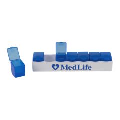 personalized white pill case with blue removable day compartments and an imprint of a heart with a cross inside and text to the right saying medlife