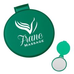 green compact mirror with an imprint saying Franc Massage
