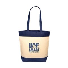 cotton tote bag with blue trims on handles, top, and bottom with an imprint on the front saying UAF Smart Academy