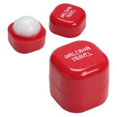 red cube lip balm with an imprint saying saleana travel