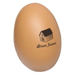 brown egg stress reliever with a barn house image and text under saying brun farms