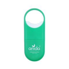 green mini hand sanitizer spray with an imprint saying anida Pharmacy