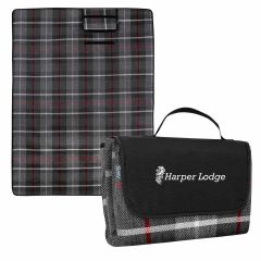 plaid roll up blanket with an imprint on the flap saying harper lodge