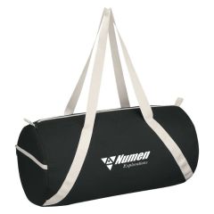 black cotton duffel bag with white straps, compartments, and an imprint saying Numen Explorations