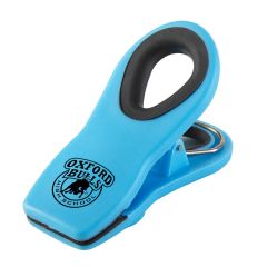 light blue food clip with grip on the handle and an imprint on the tip saying oxford bulls high school