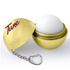 gold lip balm keychain with an imprint saying Tune