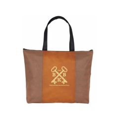 orange tote bag with black handles and an imprint saying Barcelona Business Key