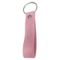 pink leatherette key ring with an imprint saying igor investments