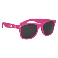 pink sunglasses with an imprint on the left saying live on live