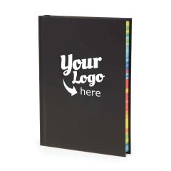 a black notebook with a black bookmark, rainbow pages, and an imprint saying harlequin party & Event consultants