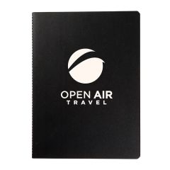 black notepad with an imprint saying Open Air Travel