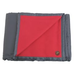 red and gray picnic blanket with an embroidered imprint saying skinny ranch
