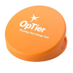 orange round food clip with an imprint saying optier putting first things first