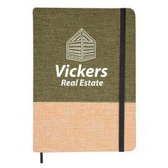 green and natural-colored polyester cover with a black elastic strip and bookmark and an imprint saying Vickers Real Estate