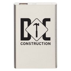 silver power bank with a led light indicator and an imprint saying DC Construction