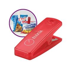 red translucent food clip with an imprint on top saying elekta