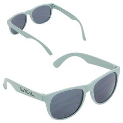 green sunglasses with an imprint on the side saying Doral Wheat Straw