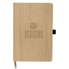 light woodtone journal with a matching bookmark and deboss saying springs resorts