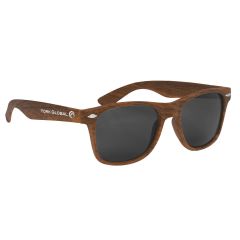 personalized woodtone sunglasses with imprint on left side of sunglasses saying york global